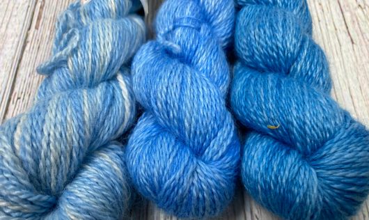 3 skeins of blue yarn