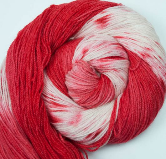 red and white corrie sock skein