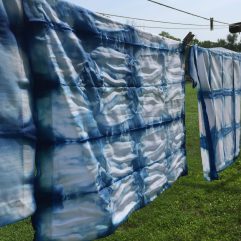 drying line with blue and white fabrics