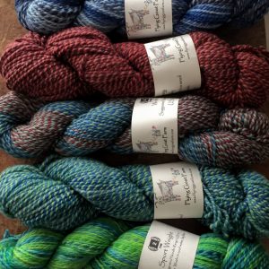 5 wool marled yarn skeins selected for nightshift shawl