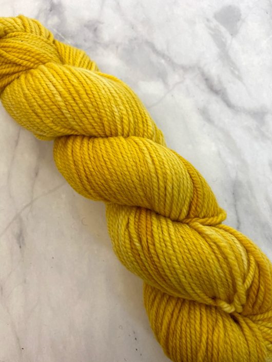 bright gold on cormo worsted yarn