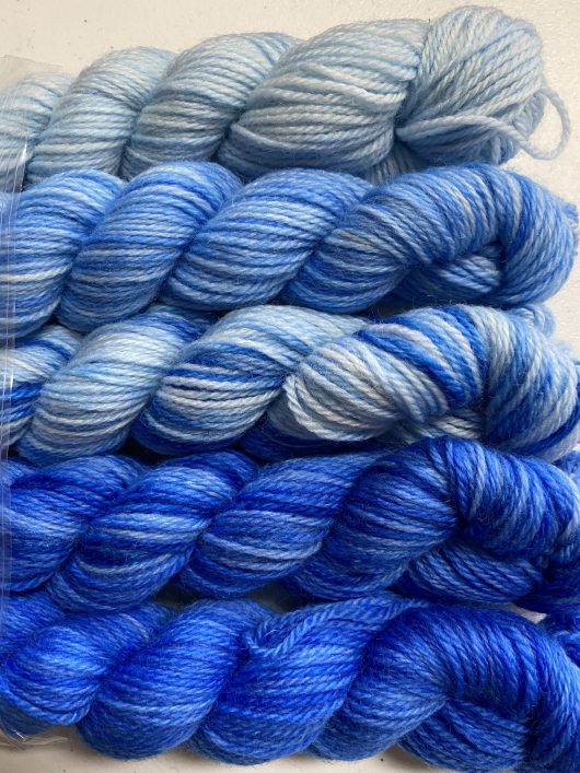 group of 5 mini skeins in light to medium blue
