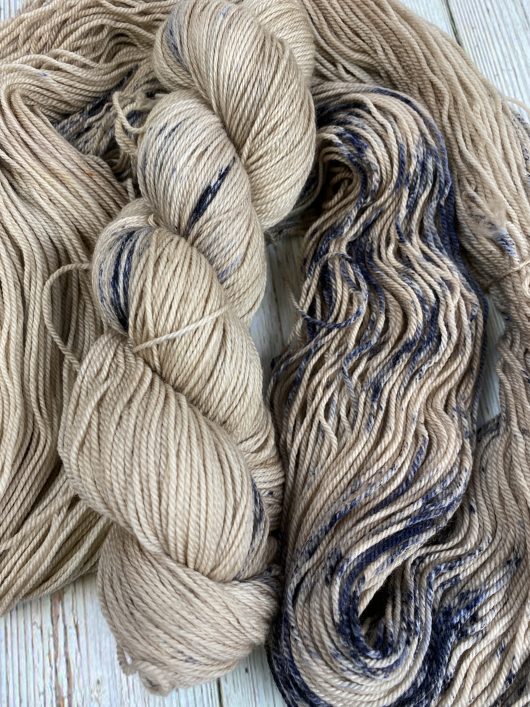 light brown yarn with navy spreckles
