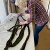person working on their handpainted skein