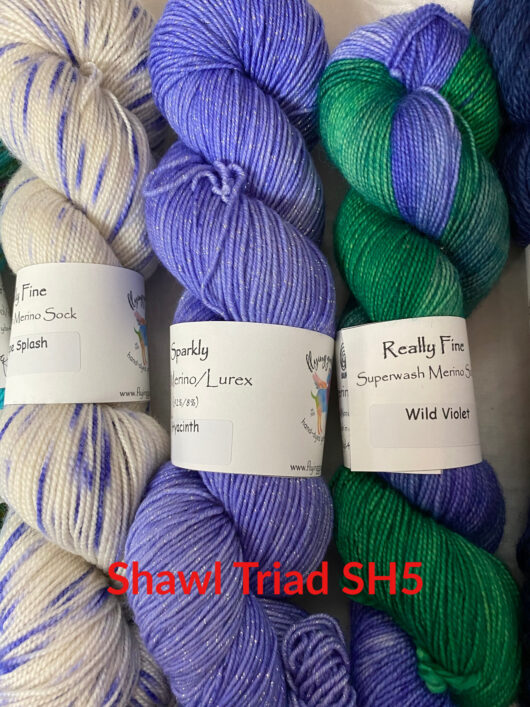 3 skeins in purples, whites and green