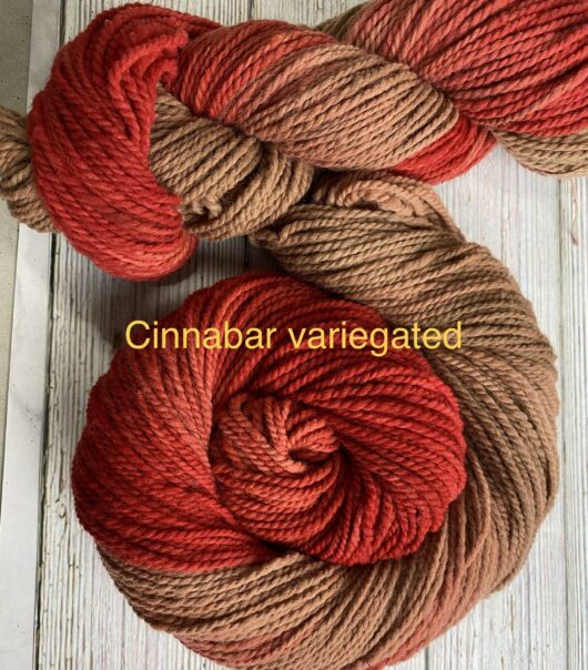 wool skeins in medium brown and deep red orange
