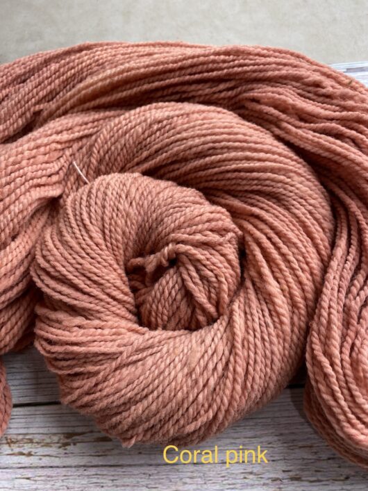 wool skein in medium coral color