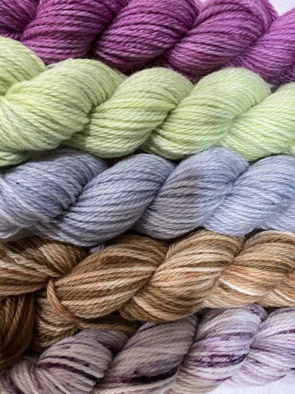 mini skein set in purple, tan, grey and green