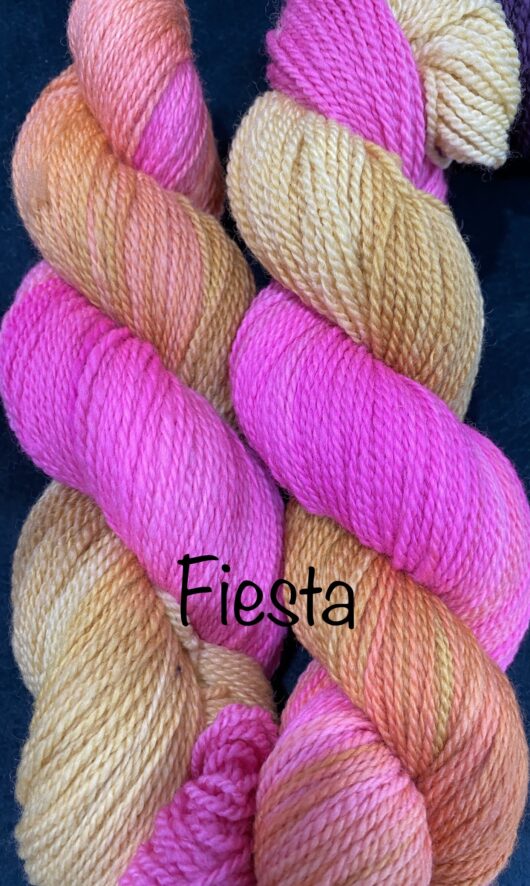 wool yarn in gold and fuschia