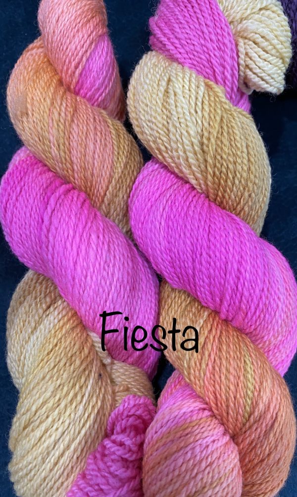 wool yarn in gold and fuschia