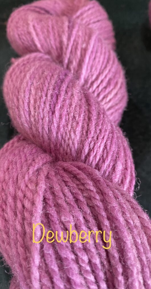 wool skein in a red violet
