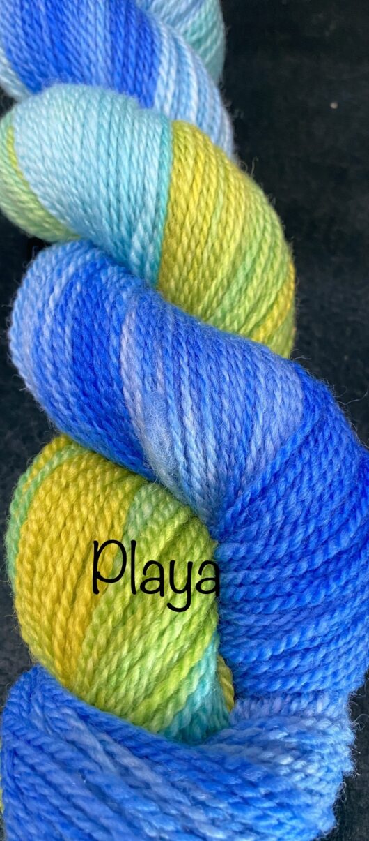 skein of yarn in blue, yellow and turquoise