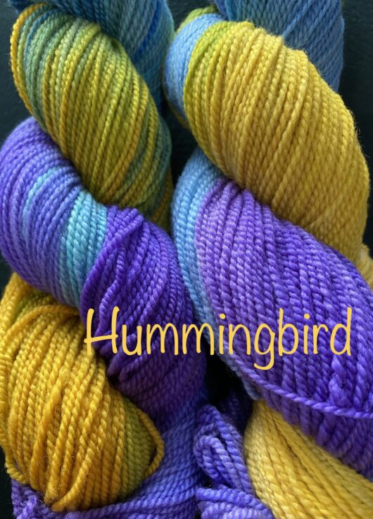 wool yarn with ochre, purple and turquoise