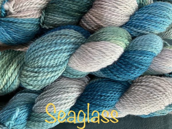 wool yarn in grey teal and green