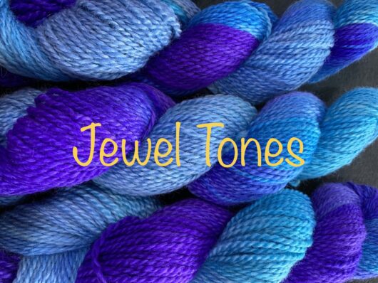 wool yarn in turquoise and purple