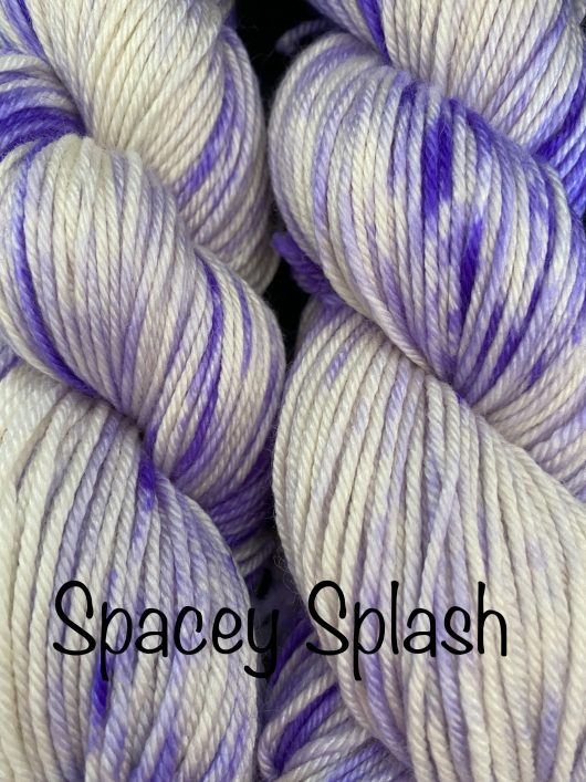 white yarn with violet splashes