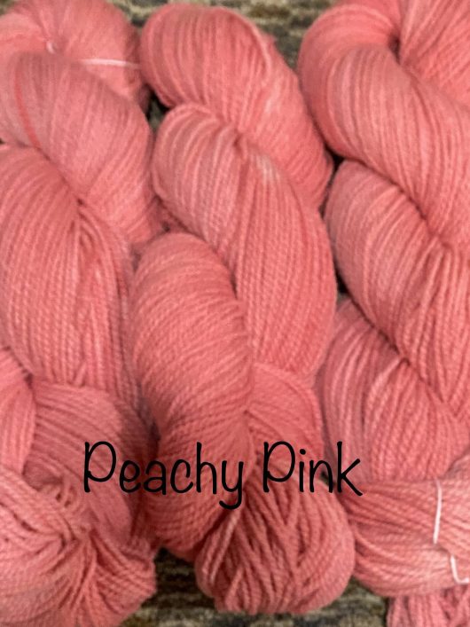 yarn in a orangy pink color
