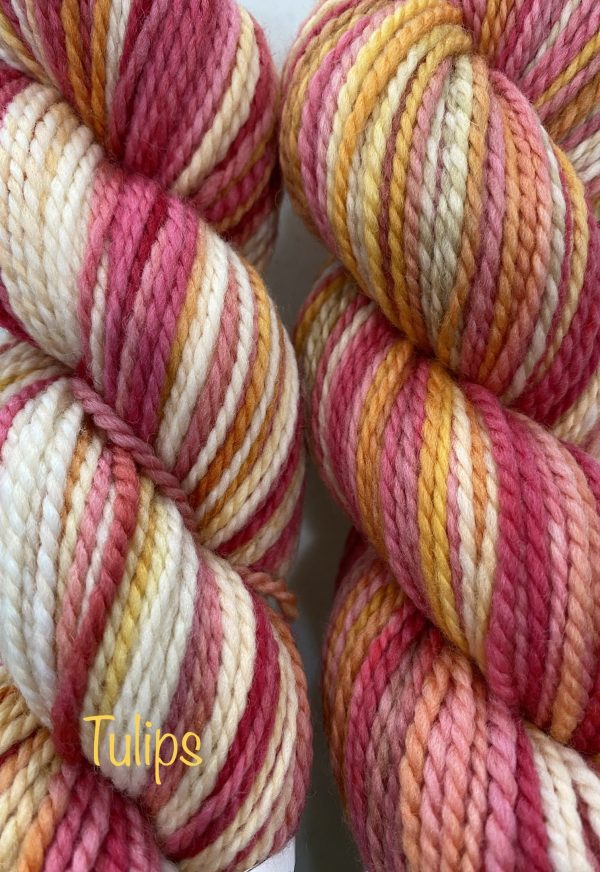 peach and red marled yarn