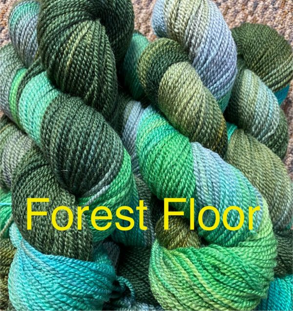 variegated skeins in greens and grey