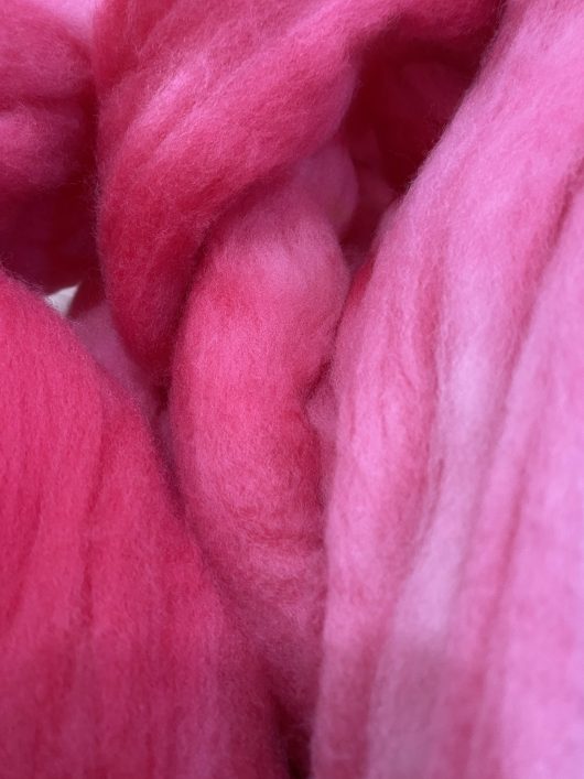 roving of various pinks and reds