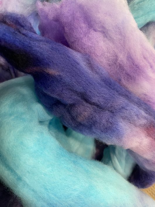 roving of teal and purple